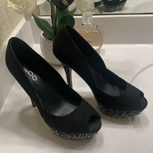 Gentle used Aldo heels, no scratches and no missing stones.